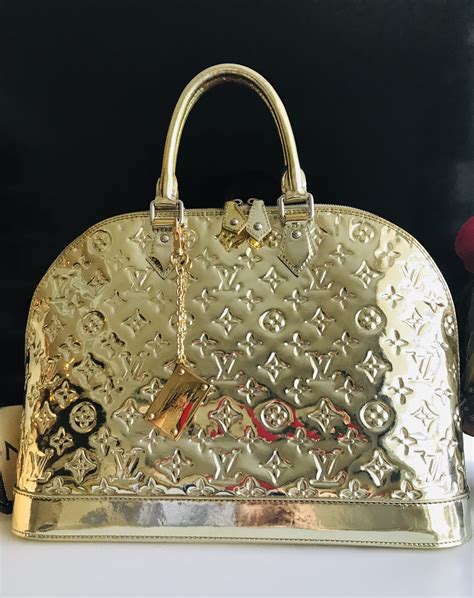 lv bag with gold plate|louis vuitton handbags logo.